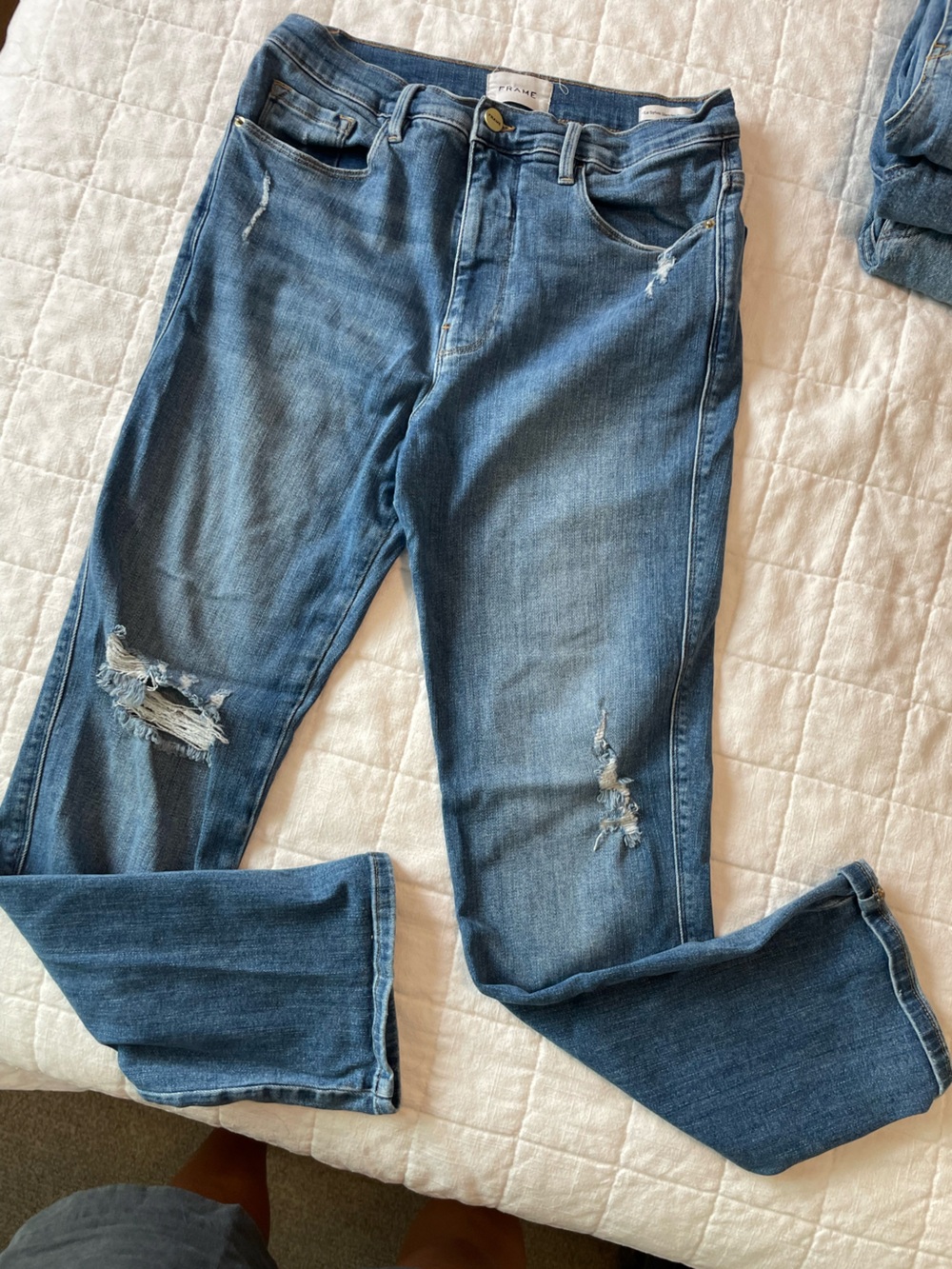 Frame Denim Skinny Jeans in Medium Blue with Distressed Knees